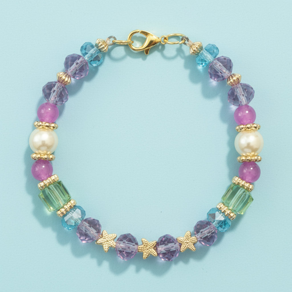 Multicolored beaded bracelet on a black textured background