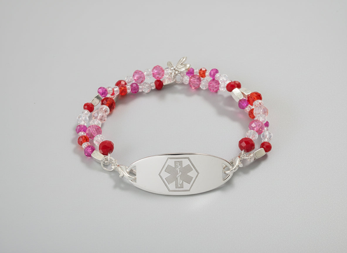 Beaded bracelet with an emergency symbol charm on a black background