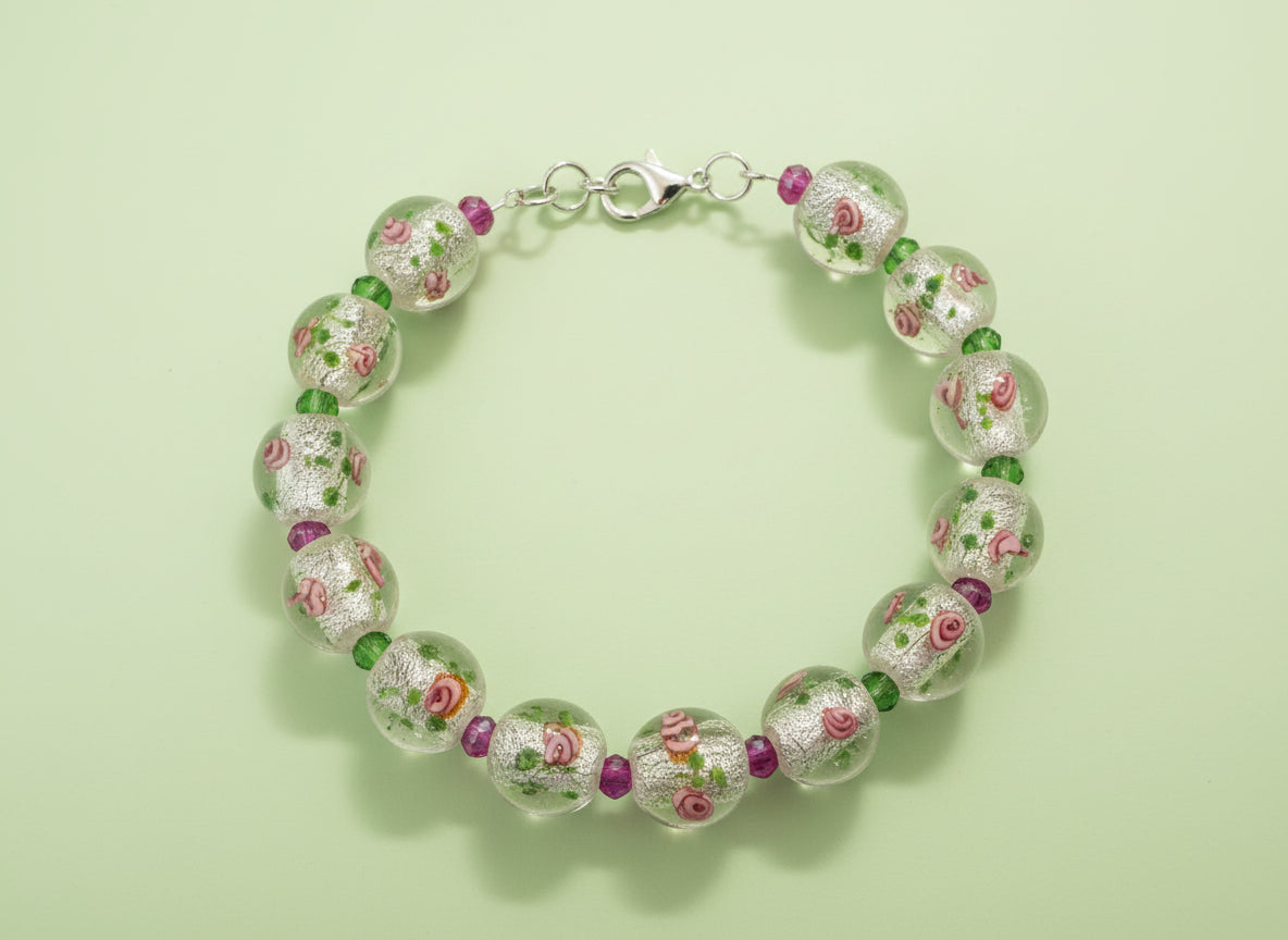 Bracelet with floral beads on a black background