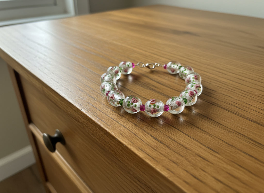 Bracelet with floral glass beads on a dark background