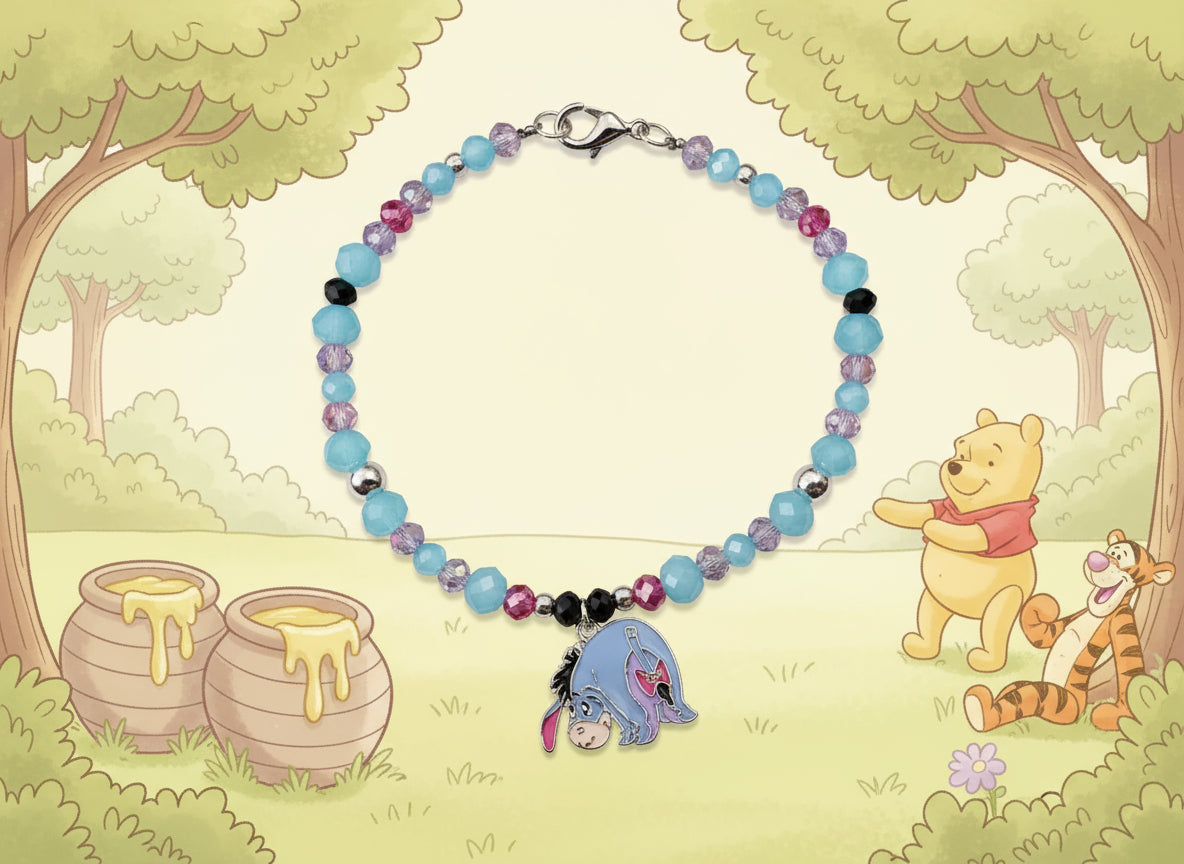 Beaded bracelet with a charm on a dark background