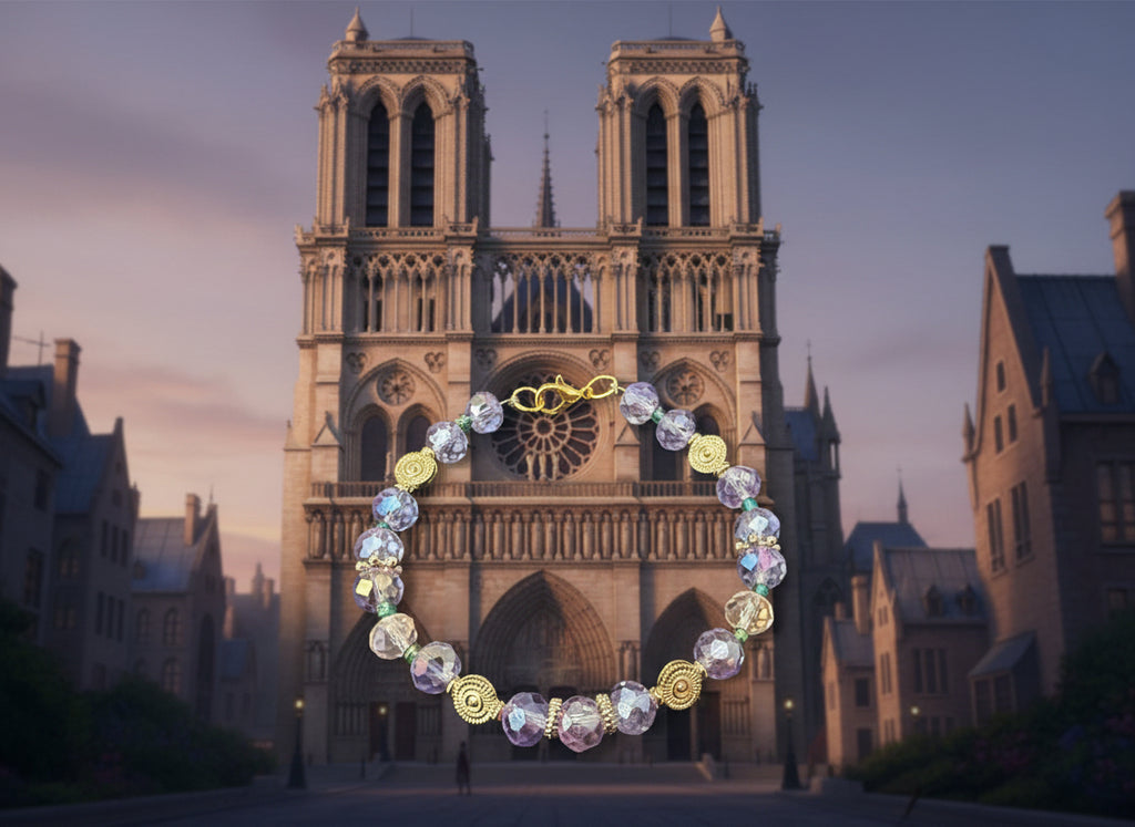 Bracelet with purple beads and gold accents on a dark textured surface