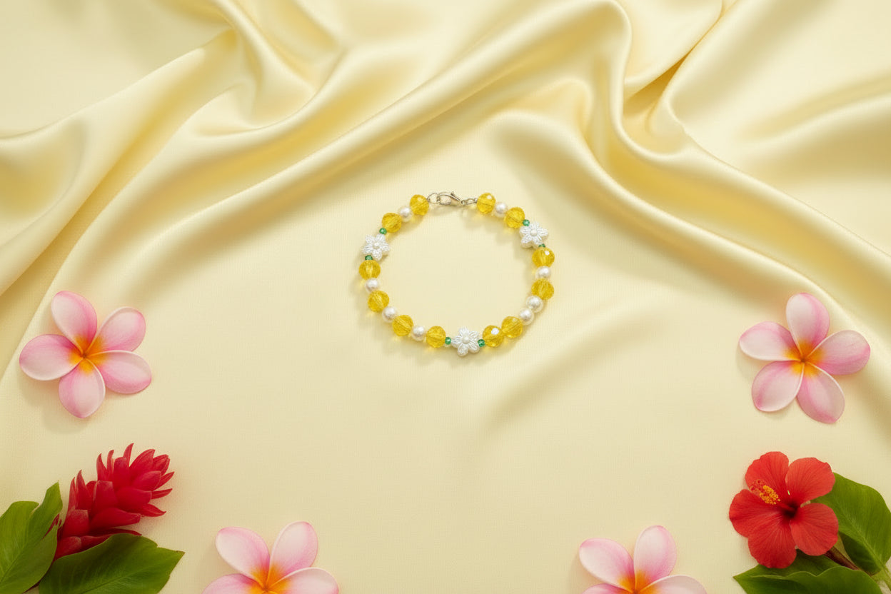 Bracelet with yellow and white beads on a dark textured background