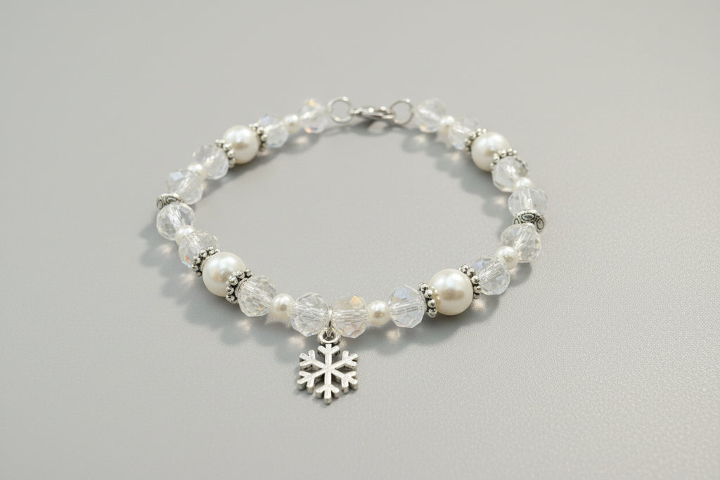 Beaded bracelet with a snowflake charm on a dark background