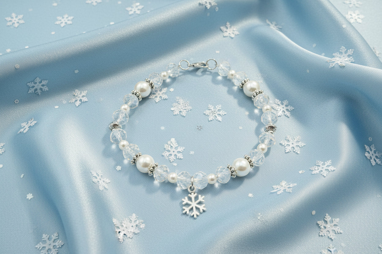 Beaded bracelet with a snowflake charm on a black background