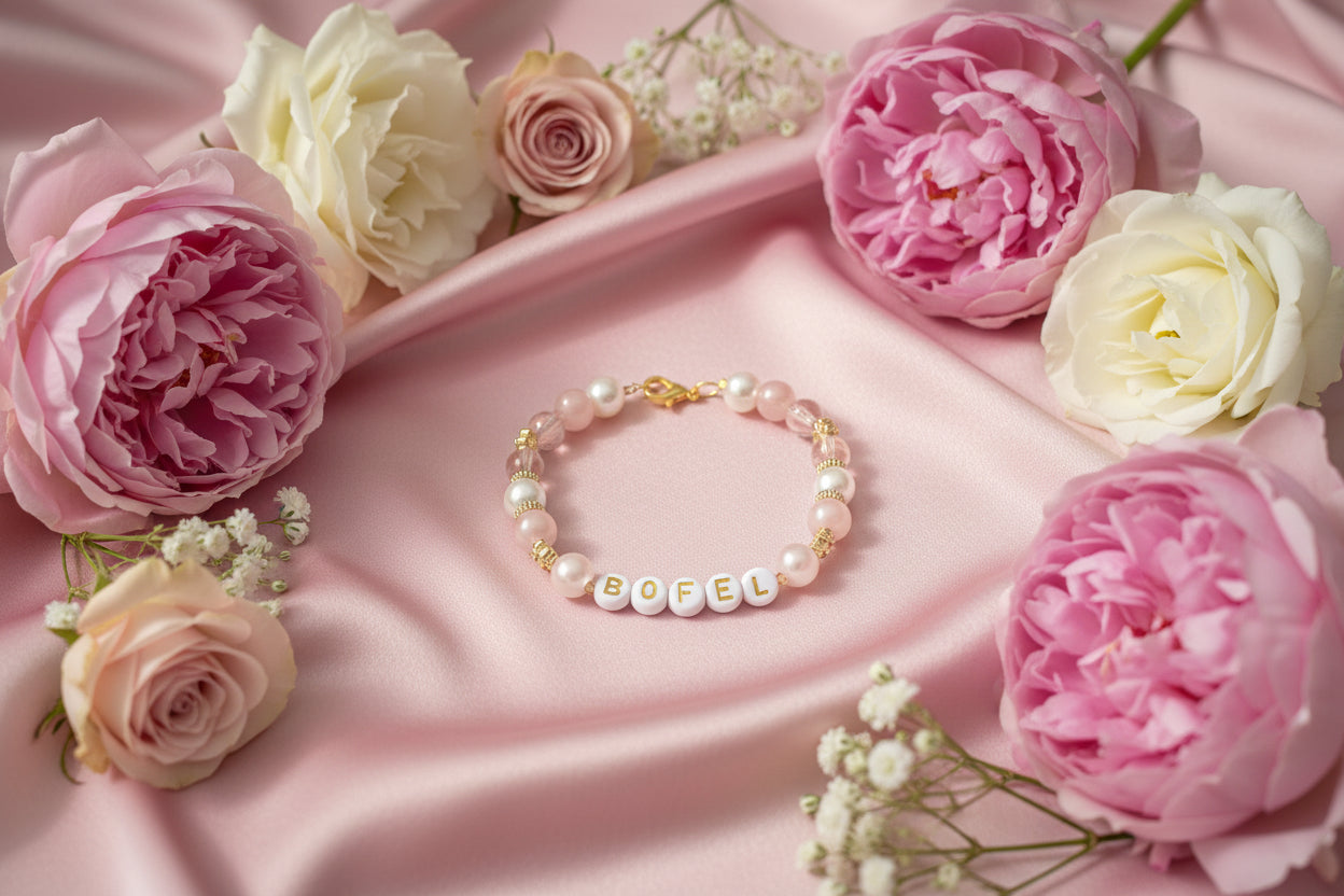 Bracelet with multicolored beads and gold accents on a dark background