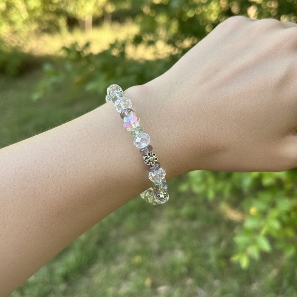 Multicolored beaded bracelet on a dark textured surface