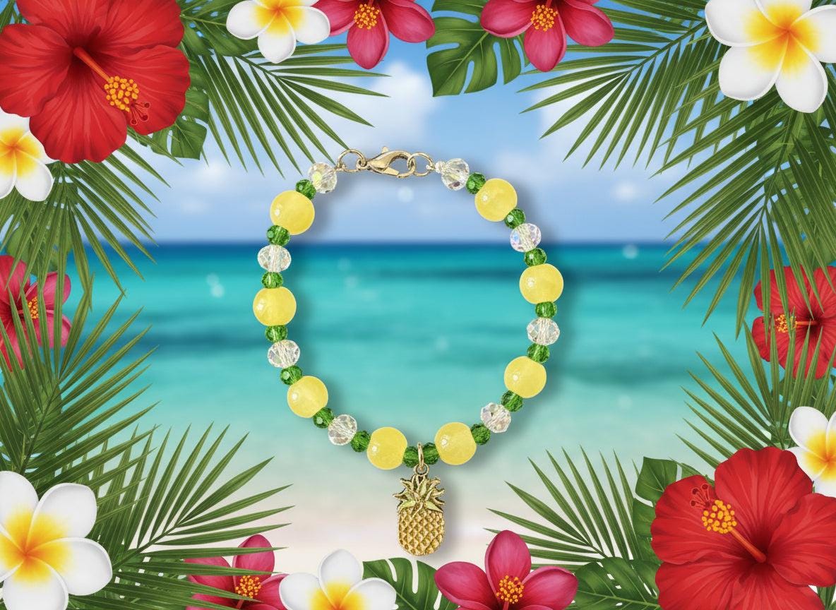 Beaded bracelet with pineapple charm on a dark textured surface