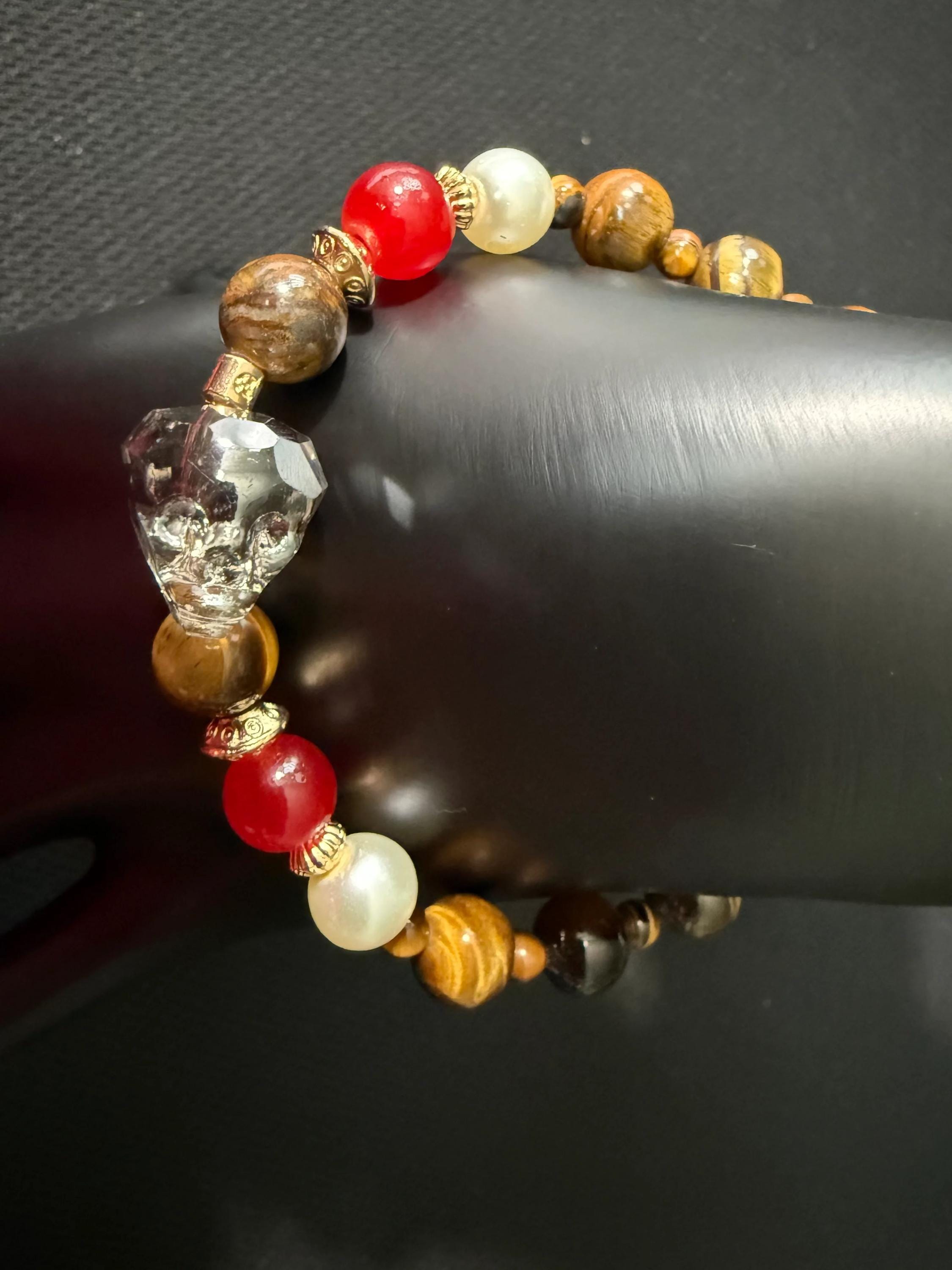 Multicolored beaded bracelet on a dark surface