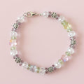 Beaded bracelet on a dark textured surface