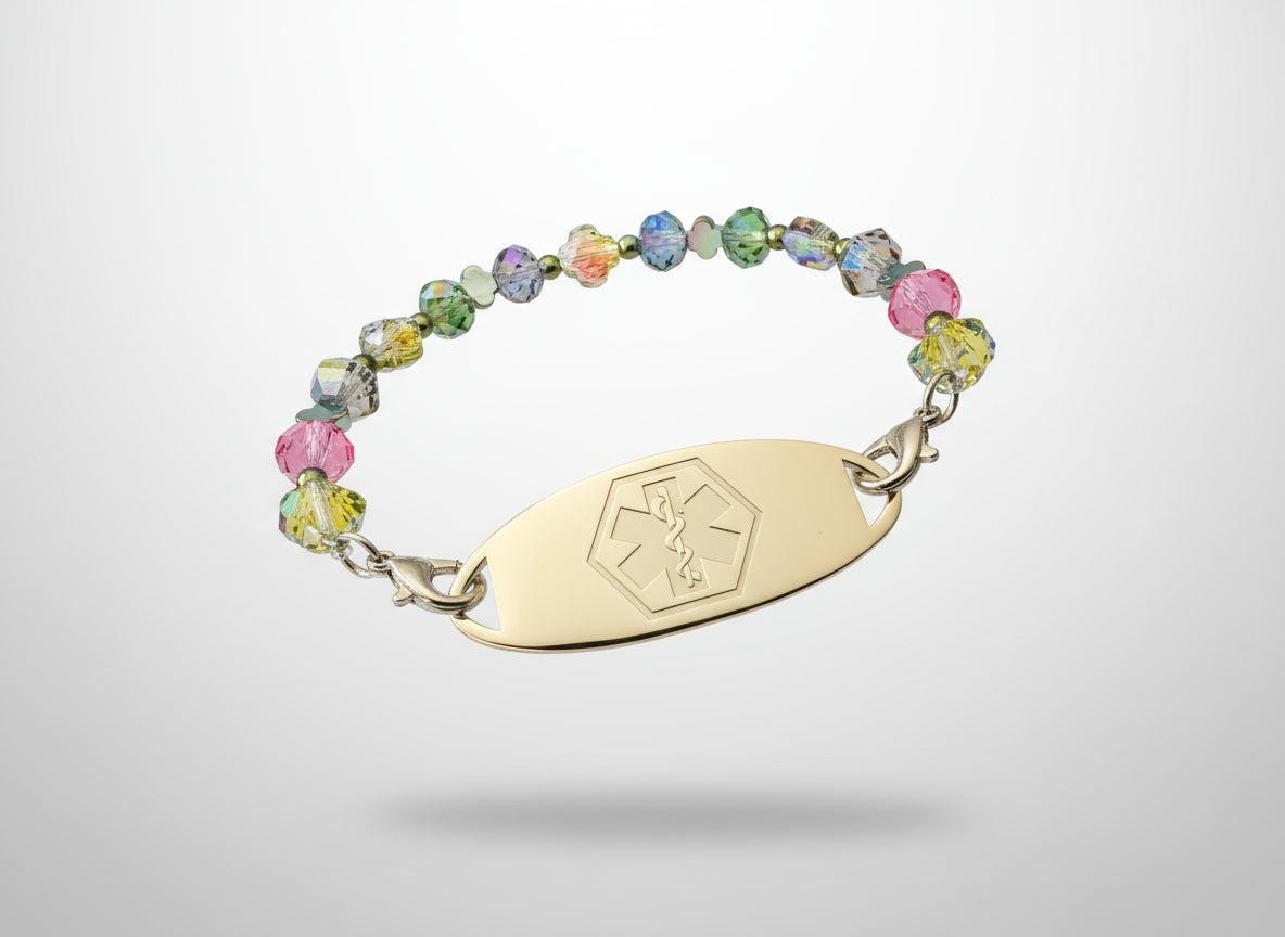 Bracelet with colorful beads and a gold tag on a black background