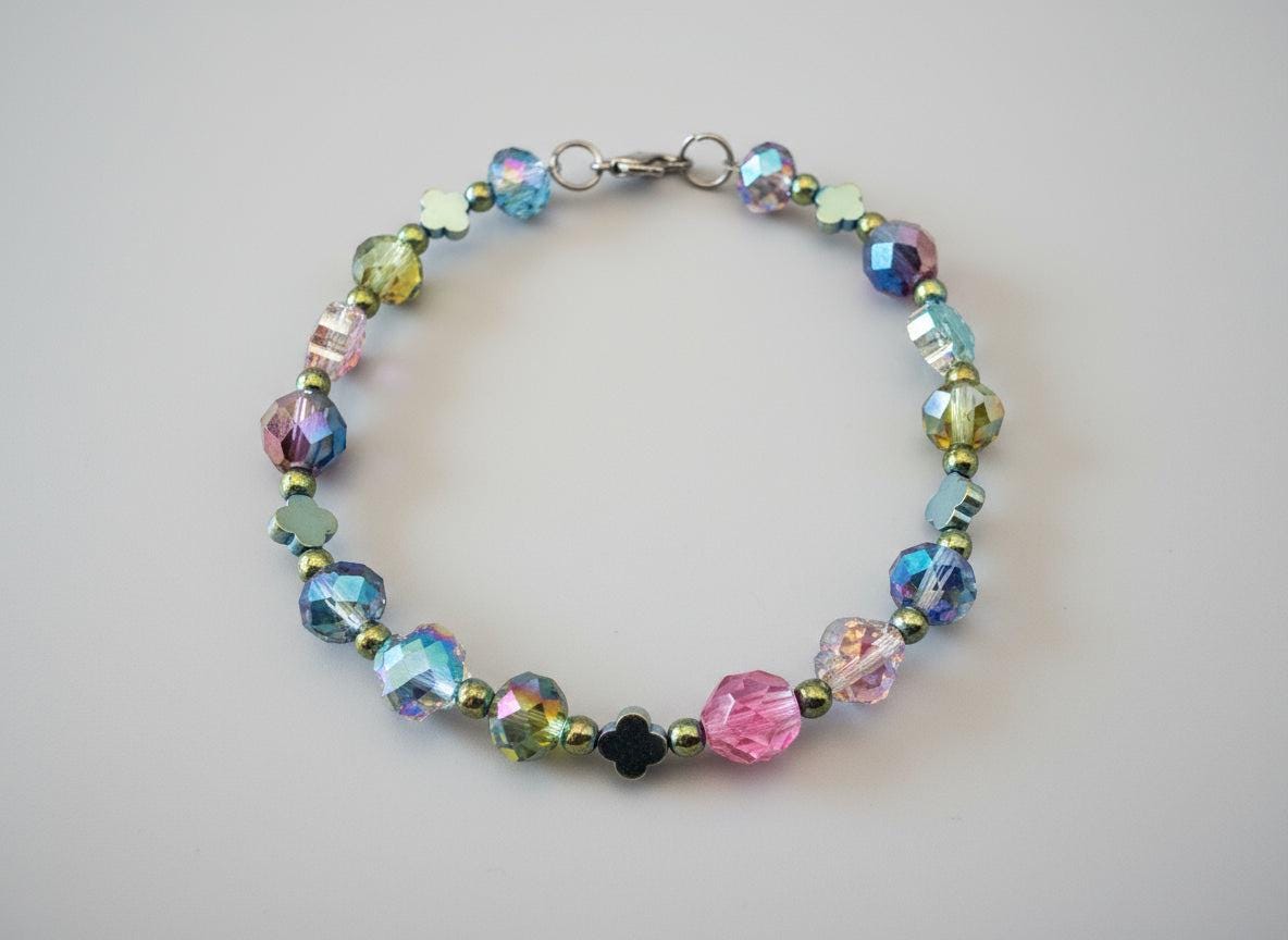 Multicolored beaded bracelet on a dark textured background