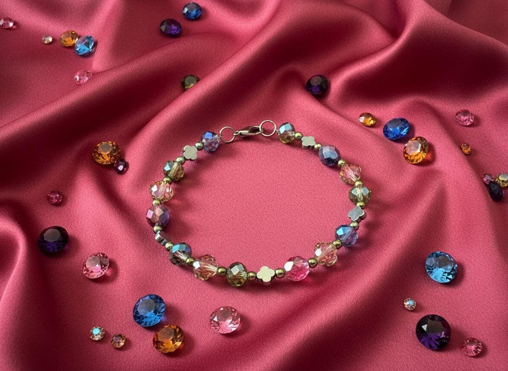 Multicolored beaded bracelet on a black textured background