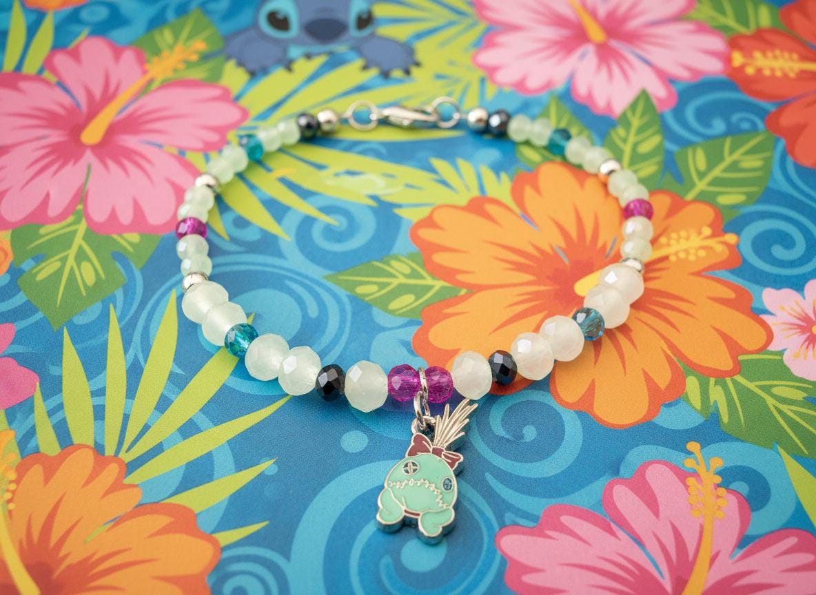 Beaded bracelet with a charm on a black background