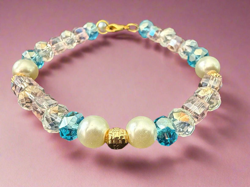 Bracelet with pearls and multicolored beads on a black background