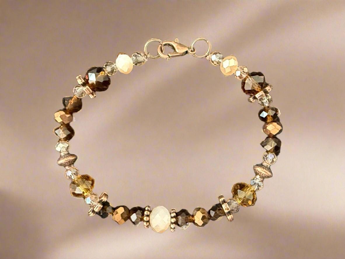 Beaded bracelet with multicolored beads on a dark fabric background