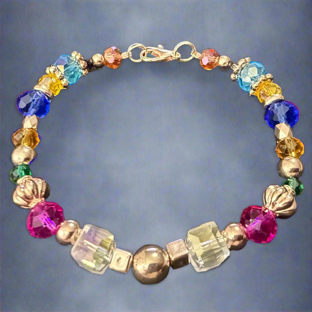 Multicolored beaded bracelet on a dark surface