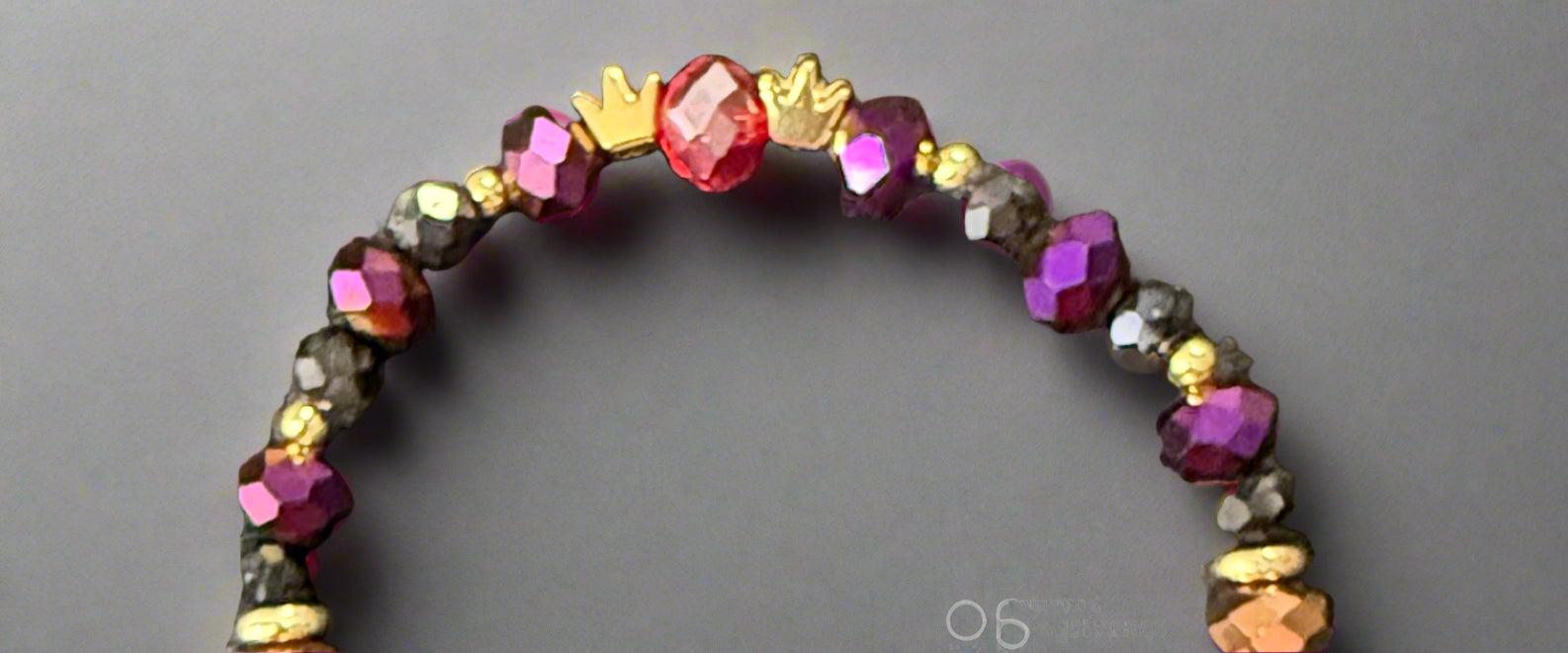Multicolored beaded bracelet on a dark textured surface